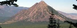 The hiking trail up Black Butte Near Mount Shasta climbs steeply, with good views of surrounding mountains.