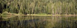 Heart Lake at the end of the Heart Lake National Recreation Trail in Lassen National Forest. The still waters reflect Brokeoff Mountain in nearby Lassen Volcanic National Park.
